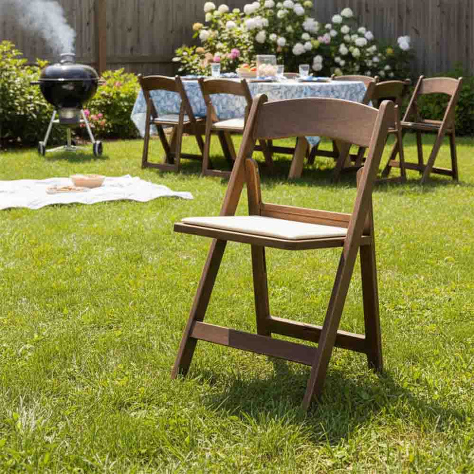 Resin Folding Chair – Fruitwood WoodGrain with Ivory Padded Seat, 850 lb Capacity | Indoor/Outdoor & Events